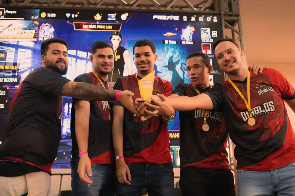 Players celebrating a massive victory on stage