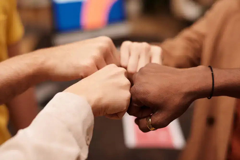Team doing a fist bump